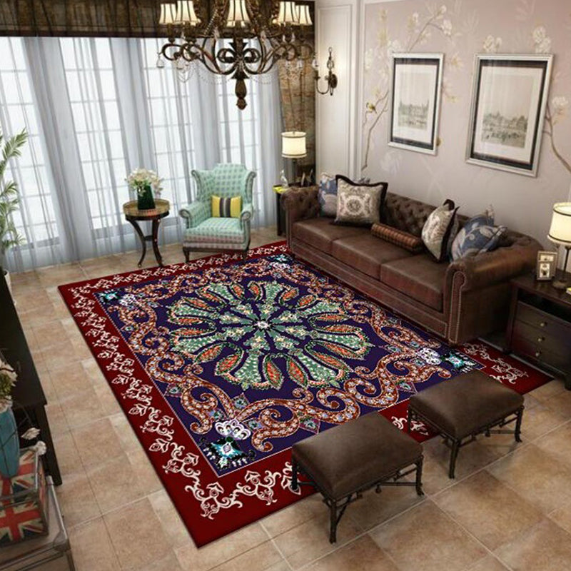 Moroccan living room carpet in red and blue medallion motif floral print carpet polyester non-slip area rug | Bowlift