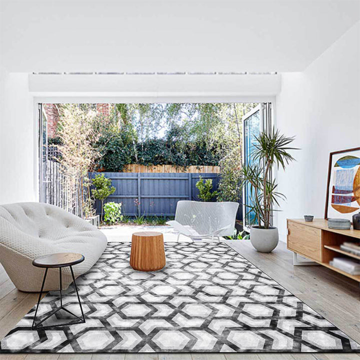 Modern living room rug in black and white with geometric hexagon pattern rug polyester non-slip backing rug | Bowlift