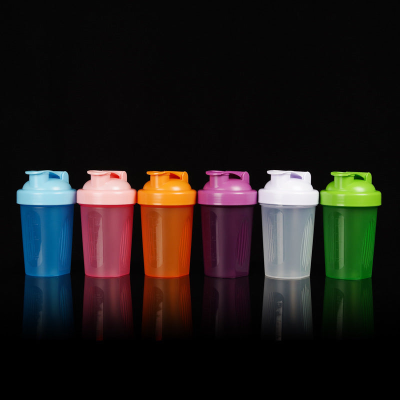 Unisex Shaker bottle with spill protection and measuring scale Bowlift