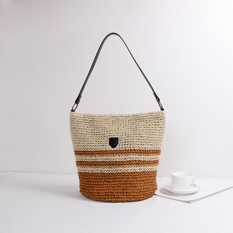 Braided shoulder bag with stylish accent Bowlift