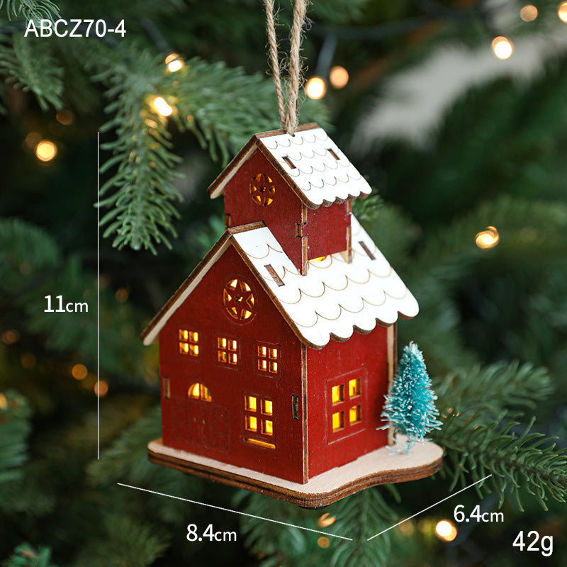 Illuminated wooden house for Christmas decoration