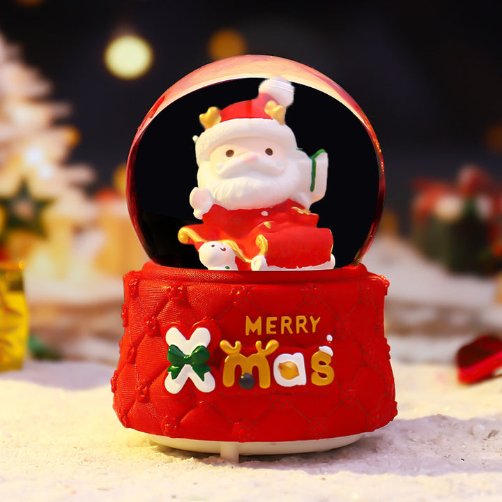 Illuminated snow globe with music and snow effect