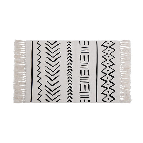 Flat-woven rug runner in Boho Mudcloth design with cotton fringes