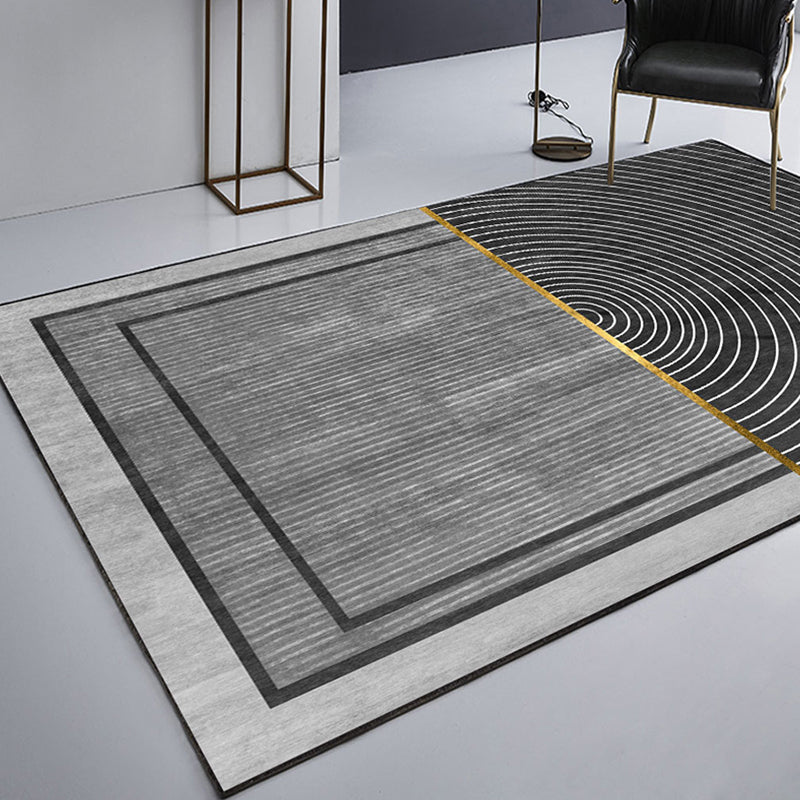 Black geometric patterned rug with stripes, modern area rug made of polyester, washable, non-slip backing rug for the study | Bowlift