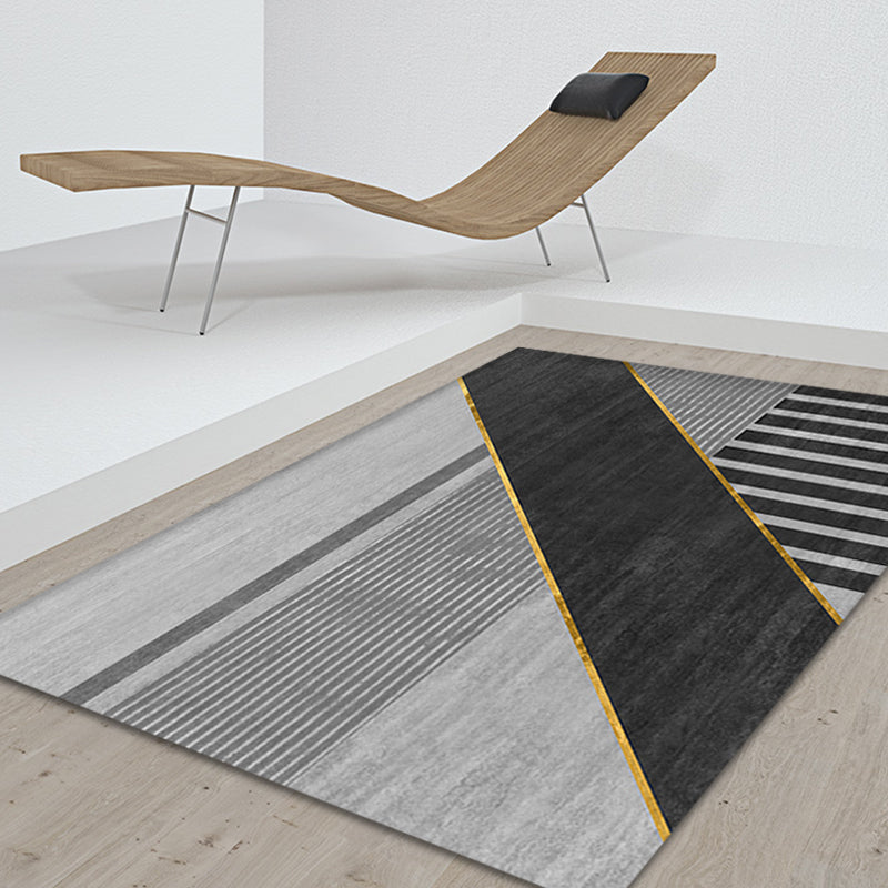 Black geometric patterned rug with stripes, modern area rug made of polyester, washable, non-slip backing rug for the study | Bowlift