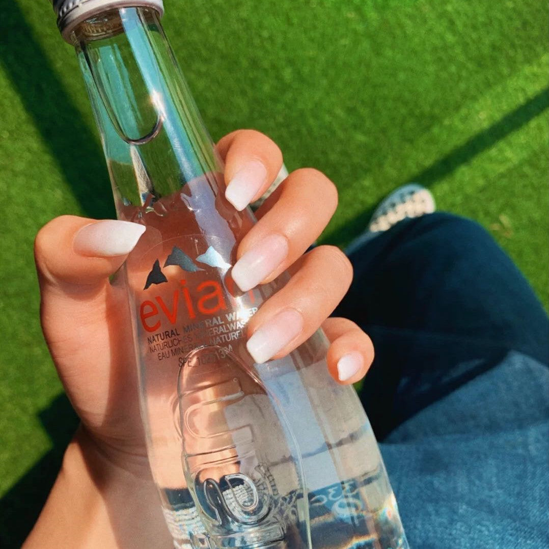 Artificial nails in modern French Tip design Bowlift