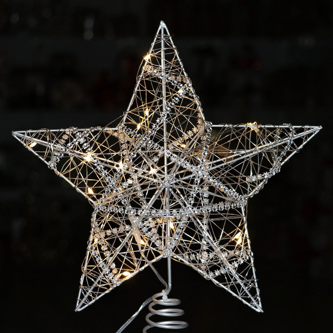 Christmas tree top star made of iron, illuminated