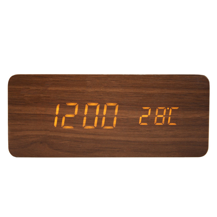 Wooden digital alarm clock with wireless charging function for smartphones