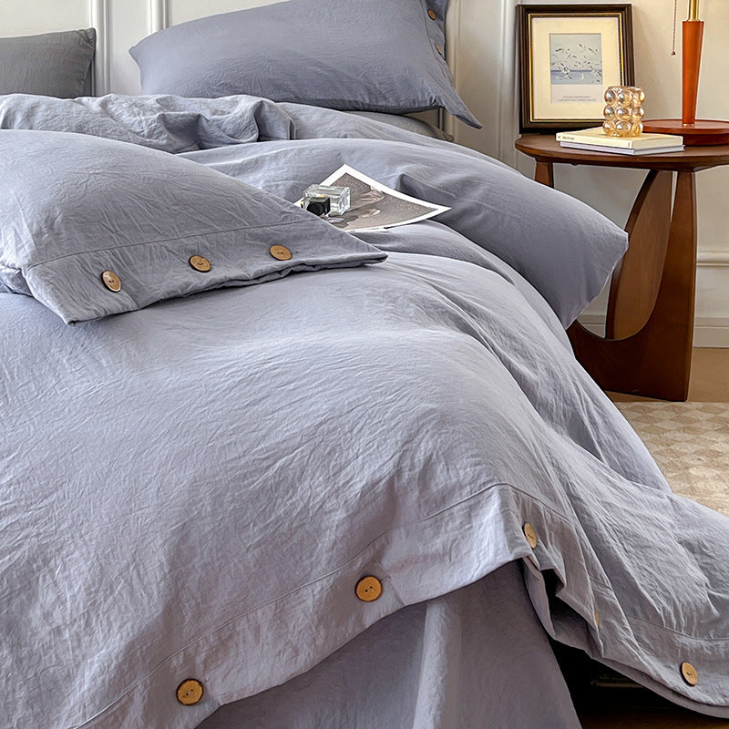 Duvet cover set made of washed cotton with button closure