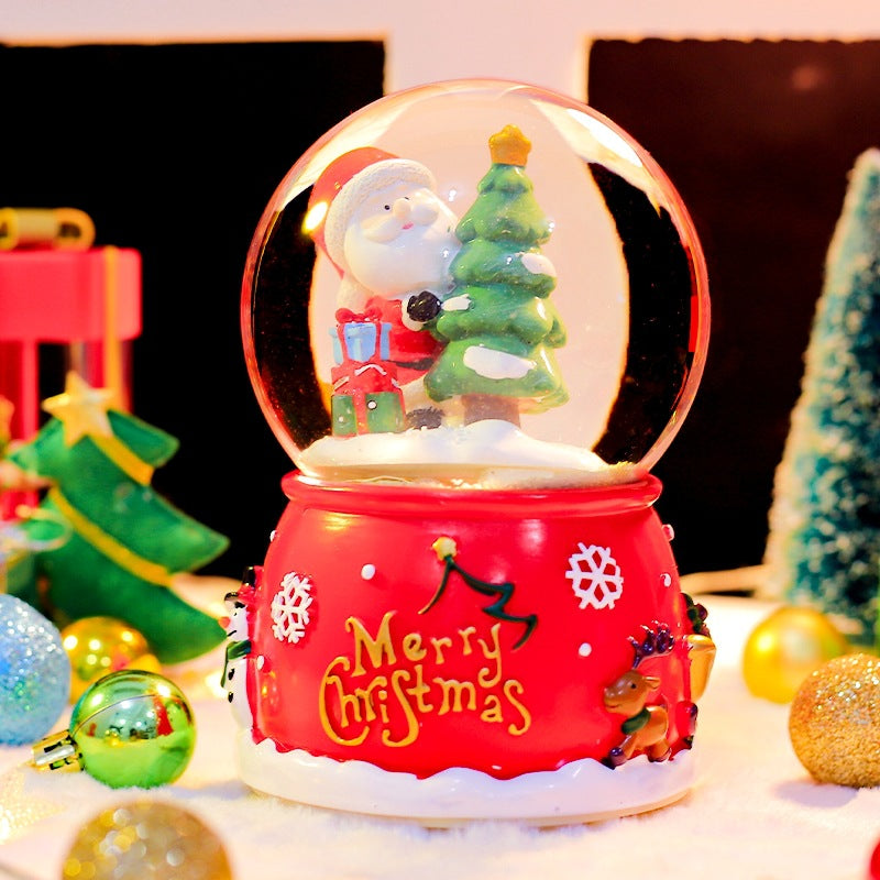 Christmas music box with glass sphere and snow effect