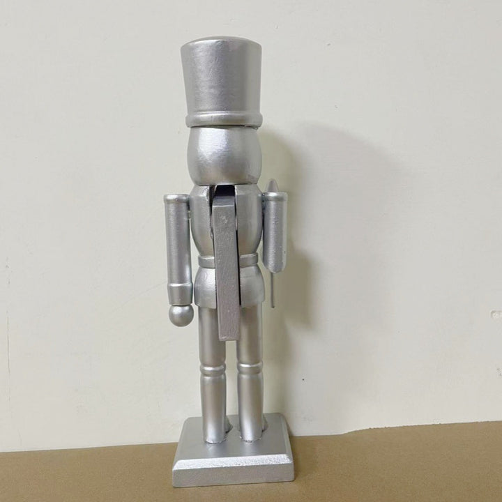 Nutcracker figure made of wood, silver-colored