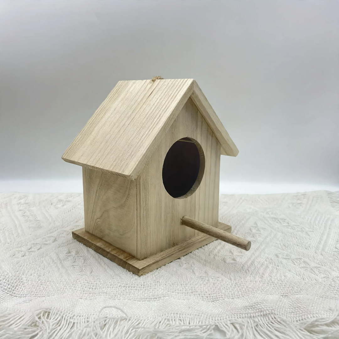 Hanging birdhouse made of solid wood for the garden