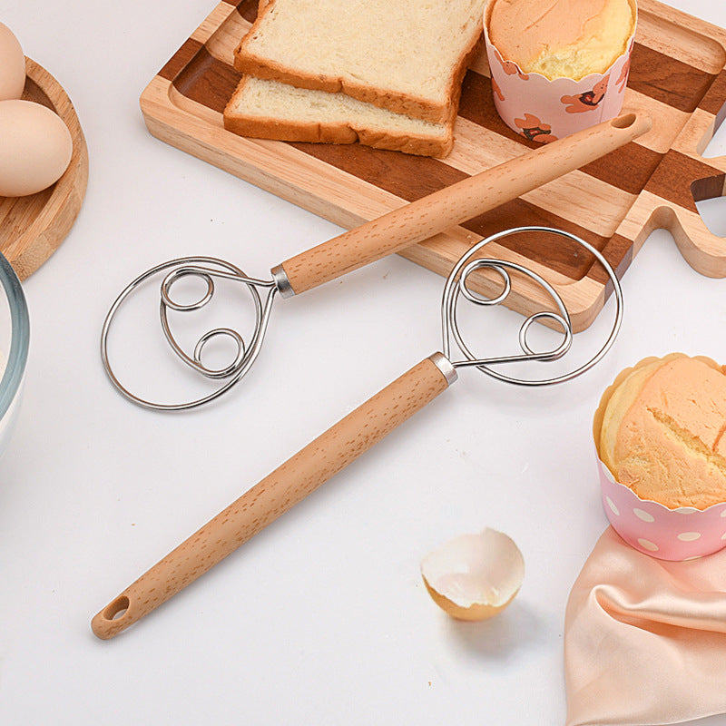 Hand-held device for kneading dough made of stainless steel
