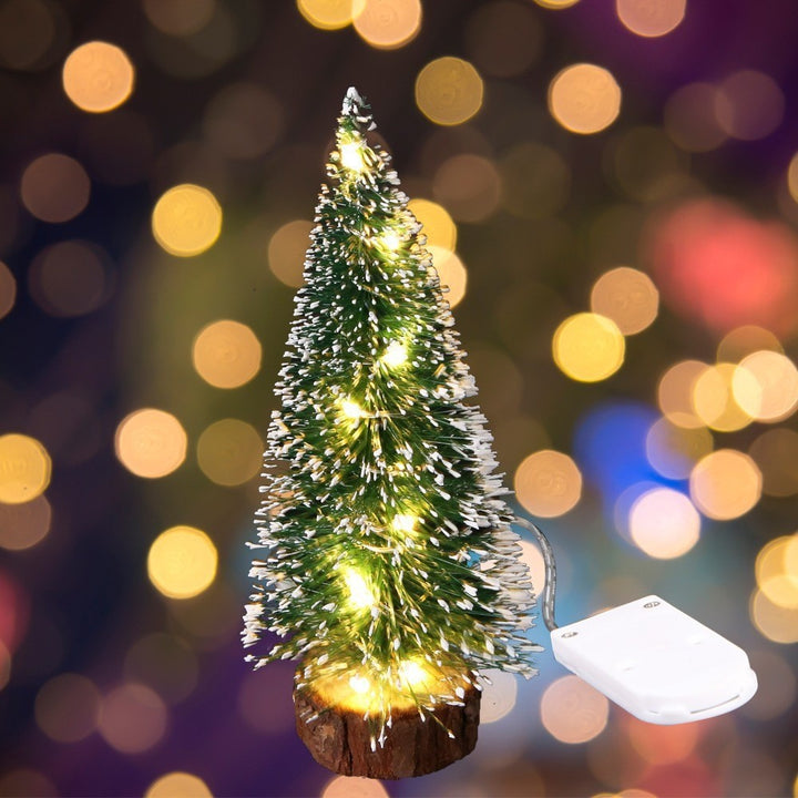 Miniature Christmas tree with snow look