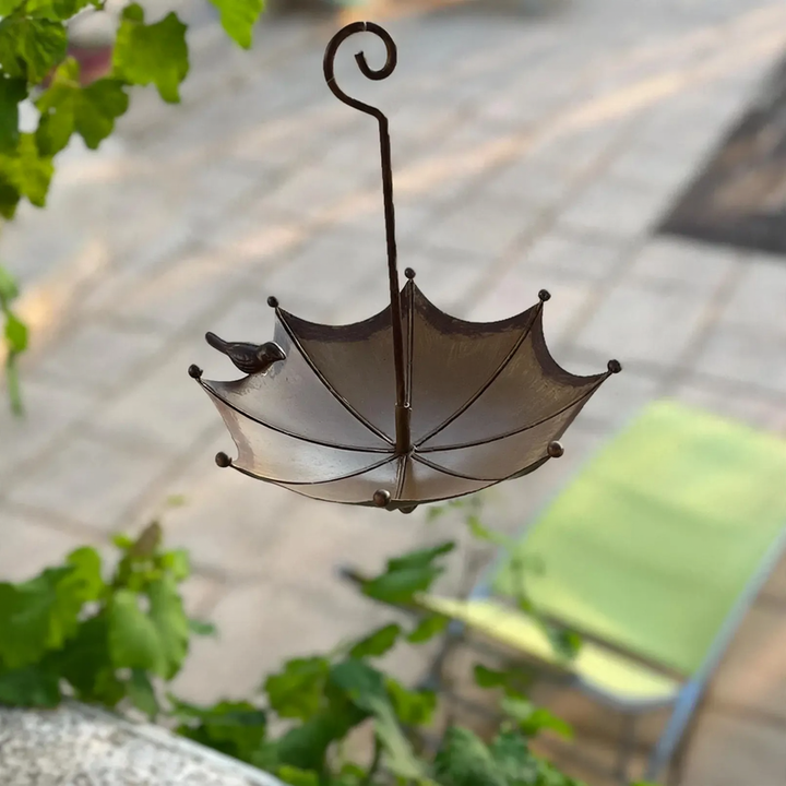 Bird bath in umbrella shape made of iron