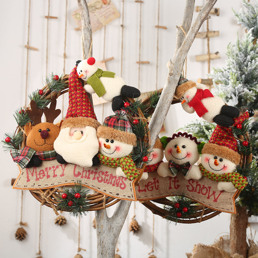 Christmas door wreath made of rattan with figures