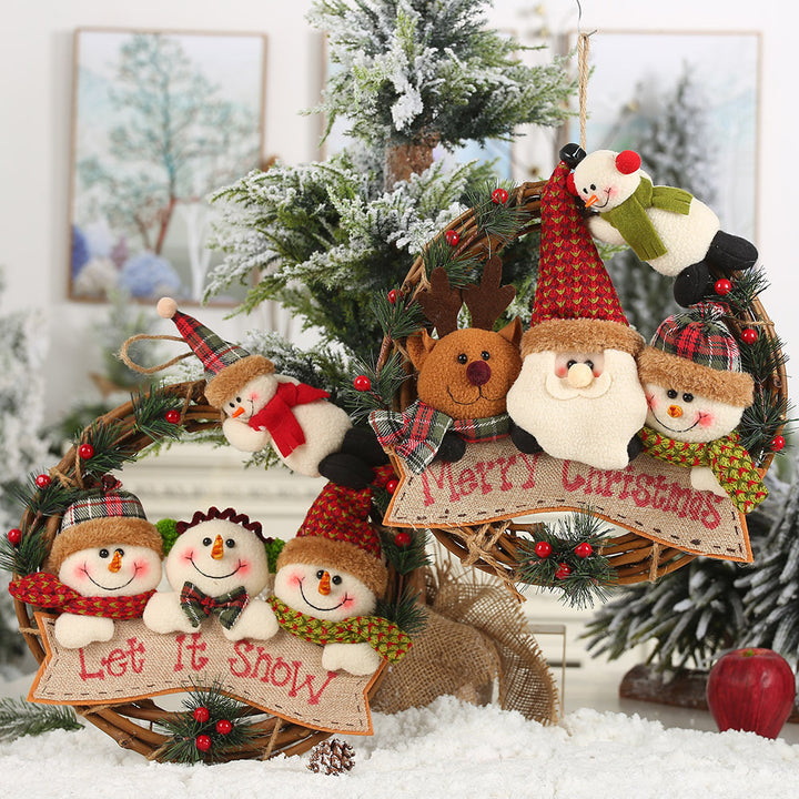 Christmas door wreath made of rattan with figures