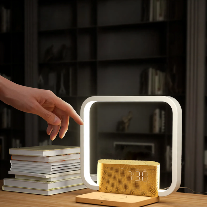 Multifunctional table lamp with clock and charging station