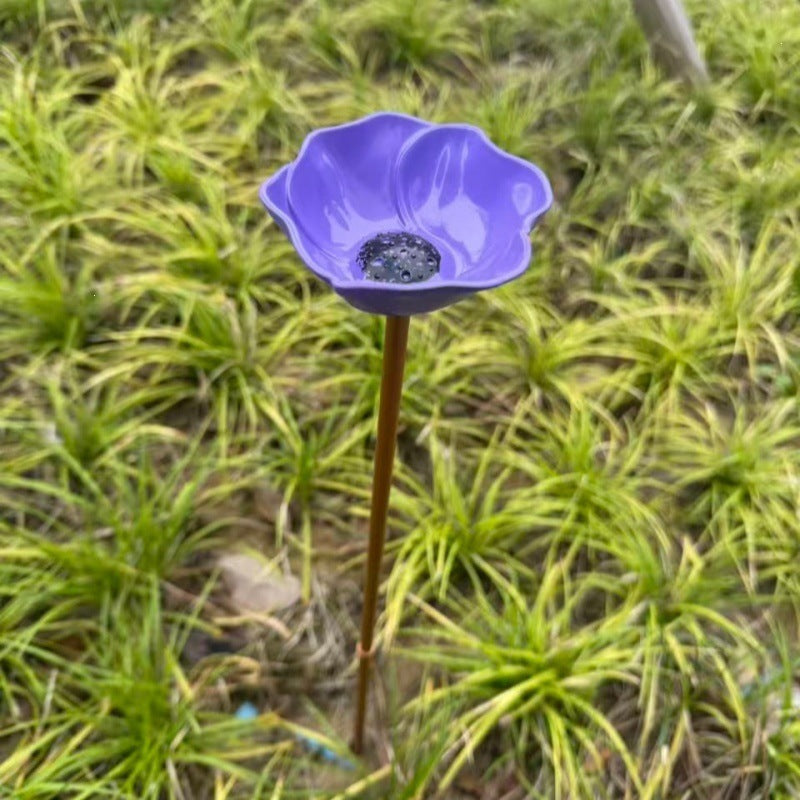 Decorative metal bird bath with ground stake