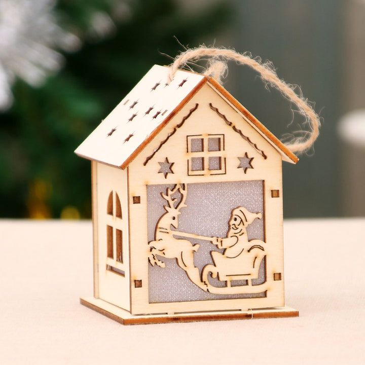 Illuminated wooden Christmas house, decorative