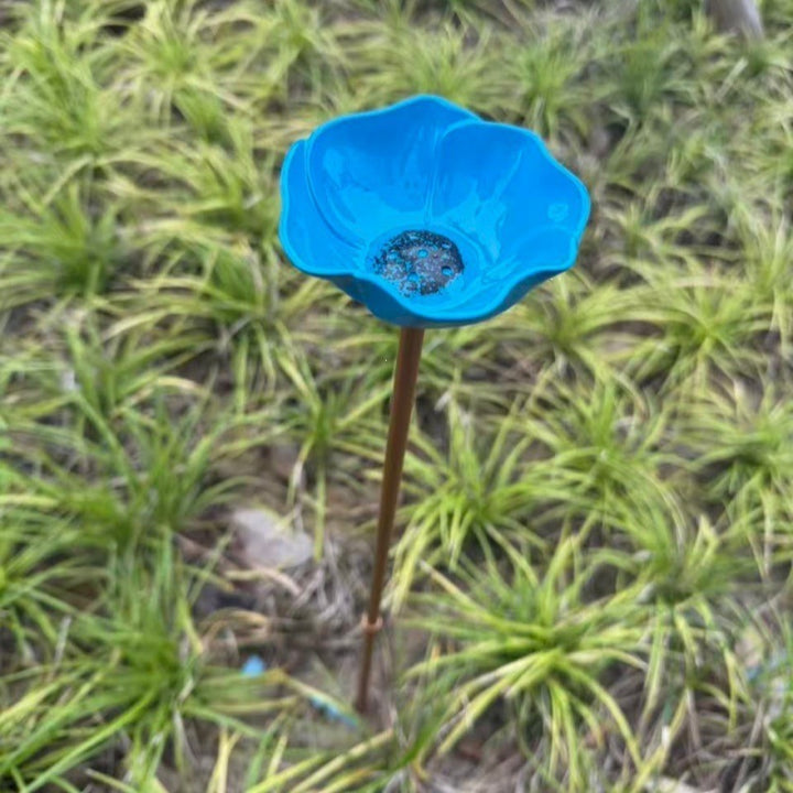 Decorative metal bird bath with ground stake
