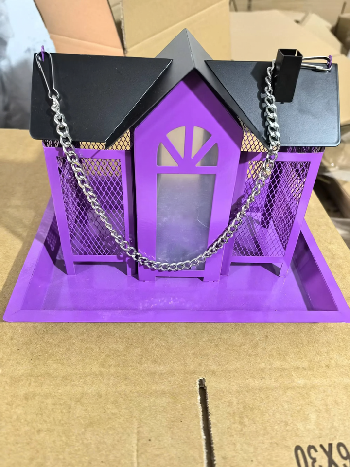 Hanging bird feeder in house shape with chain