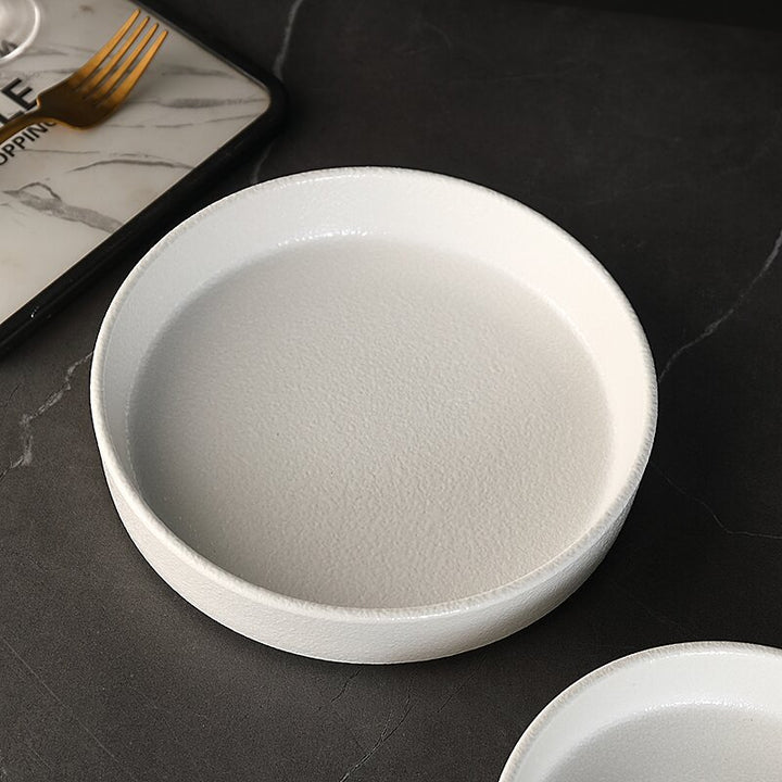 Stainless steel plate, round, 17–23 cm