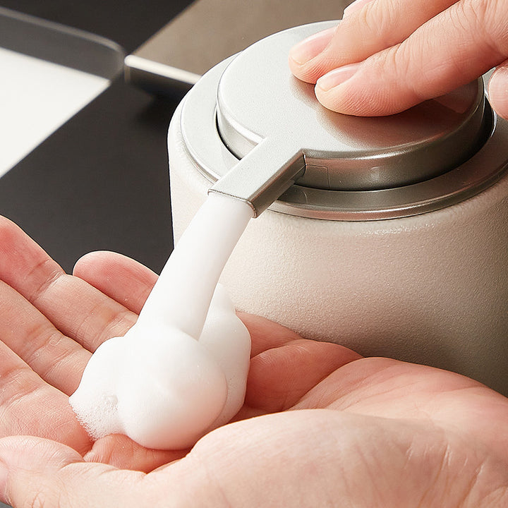 Ceramic soap dispenser with pump