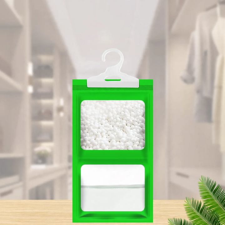 Hanging dehumidifying bag for wardrobes
