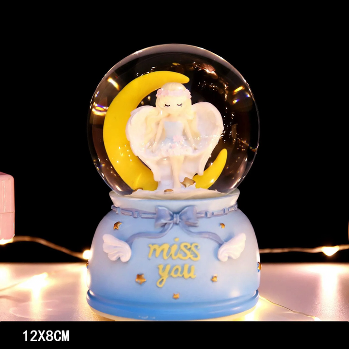 Christmas music box with snow globe and light