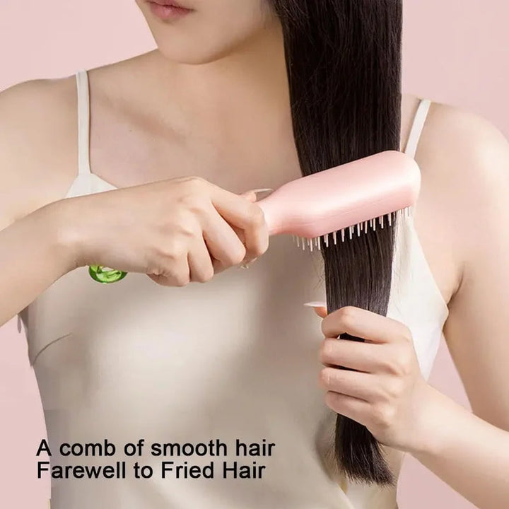 BowLift | Self-cleaning anti-static massage comb