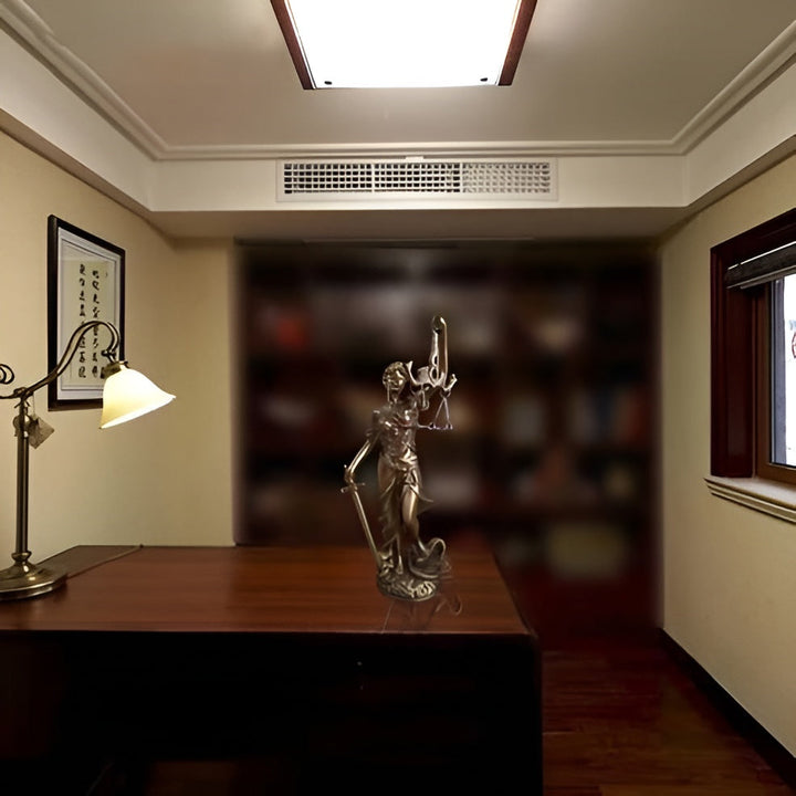 Statue of the Goddess of Justice – An elegant decorative sculpture of Justitia | Bowlift