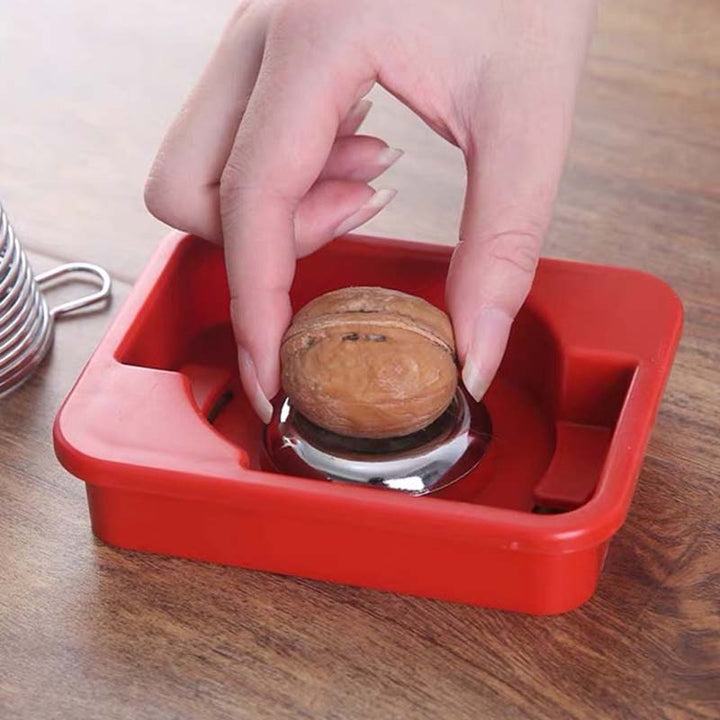 BowLift | Stainless Steel Spring Walnut Opener