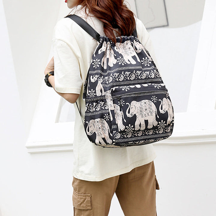 Drawstring shoulder bag in ethnic style | Bowlift