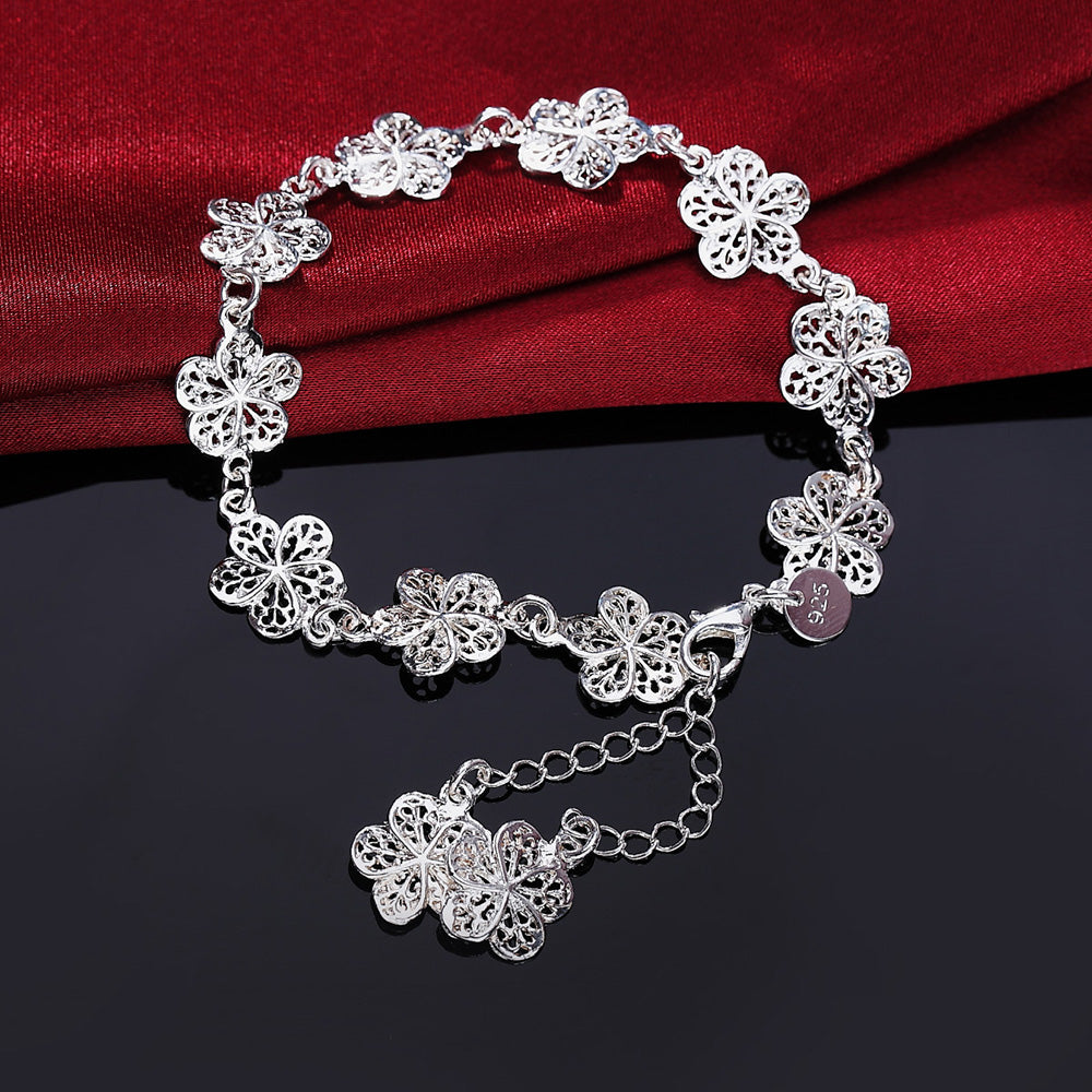 Elegant Silver Filigree Bracelet with Unique Links Bowlift