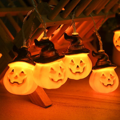 Glowing pumpkin garland Halloween with witch hats | Bowlift