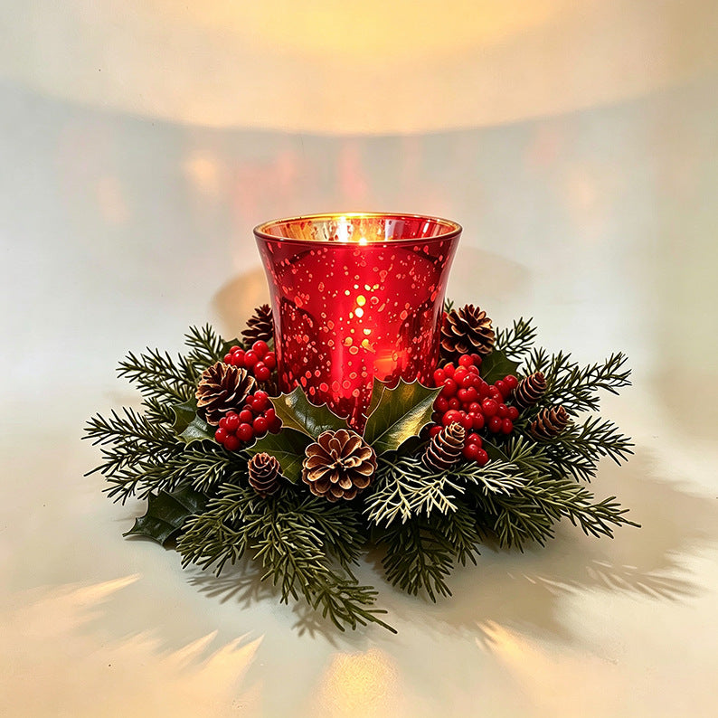 Christmas candle wreath with red berries and pine needles