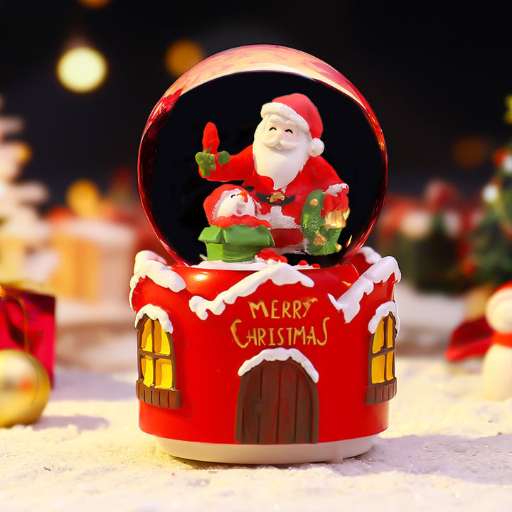 Illuminated snow globe with music and snow effect