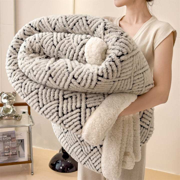 Patterned cuddle blanket with lamb fleece look
