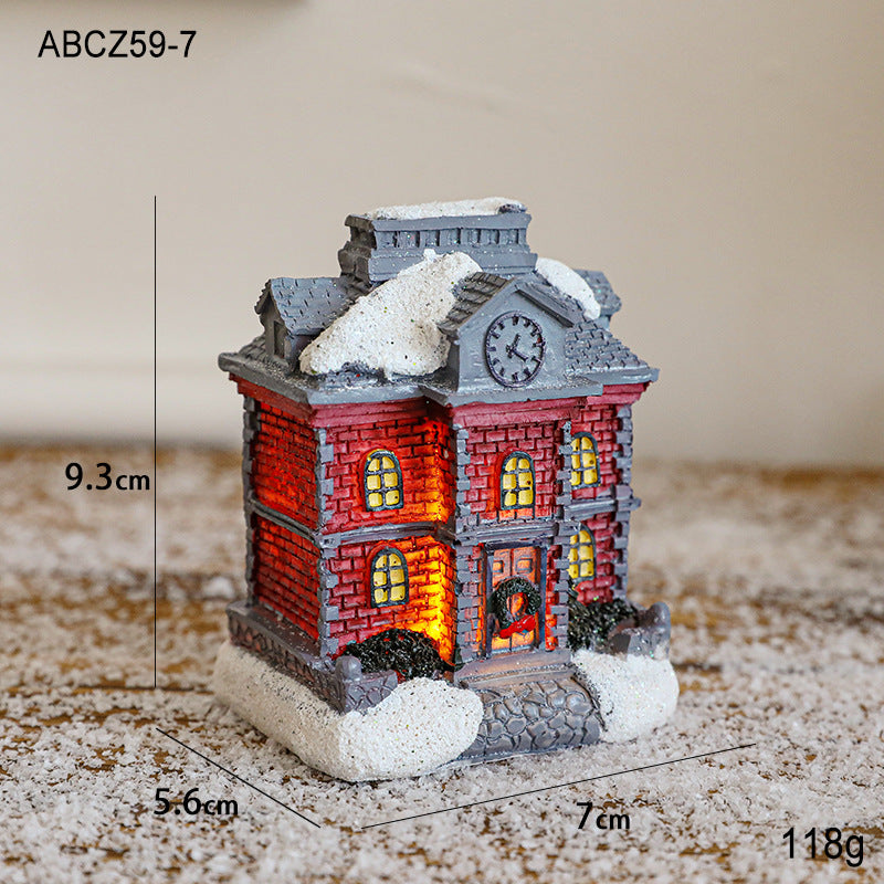 Illuminated Christmas house made of resin