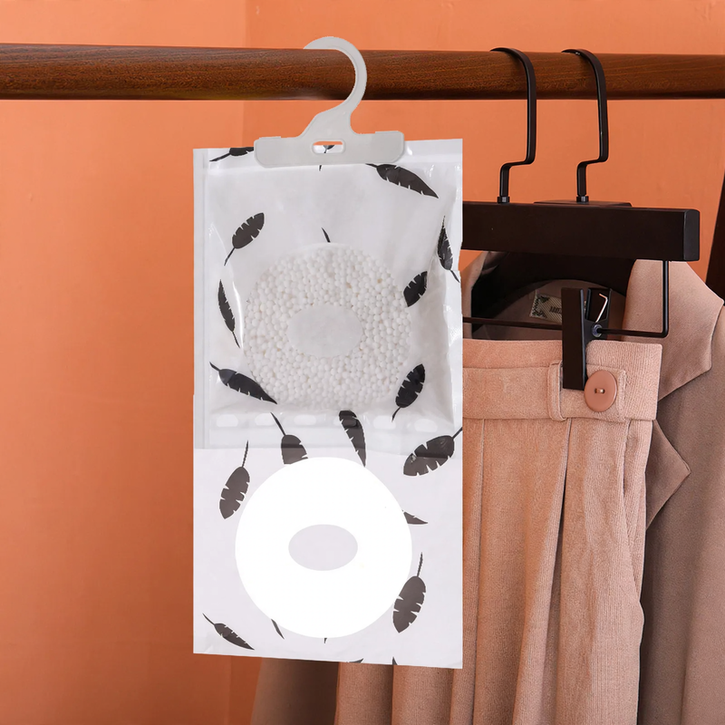 Hanging moisture absorber bag for closets