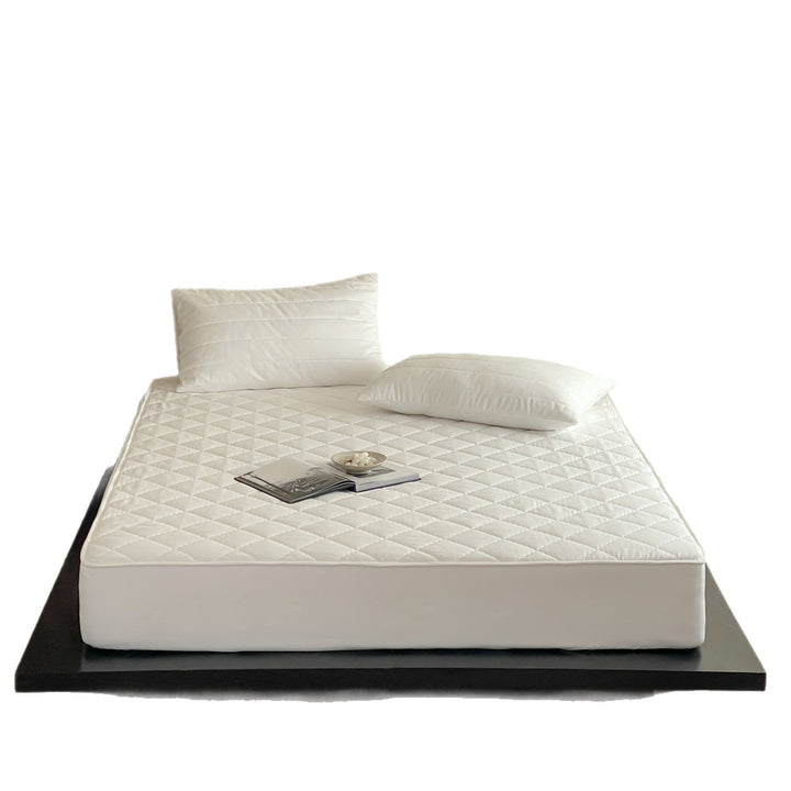 Waterproof, quilted mattress protector