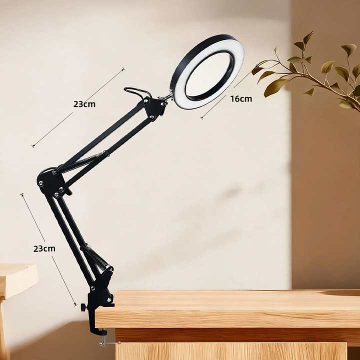 LED work lamp with long articulated arm and eye protection