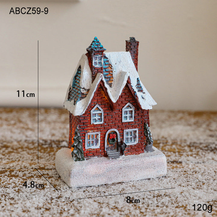 Illuminated Christmas house made of resin