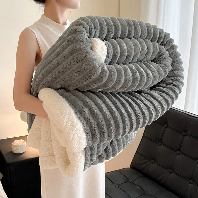 Double-layered, striped lamb fleece blanket