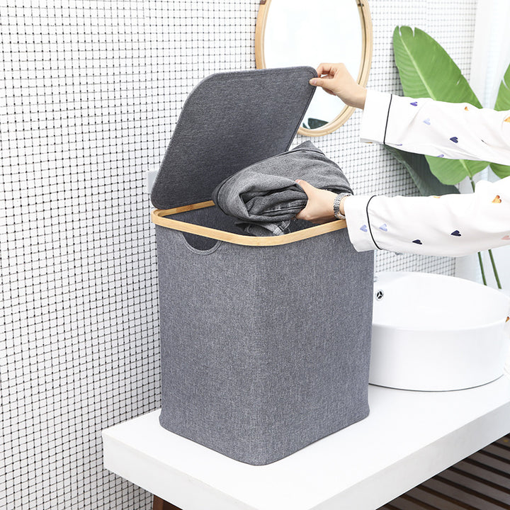 Foldable laundry basket made of bamboo and fabric