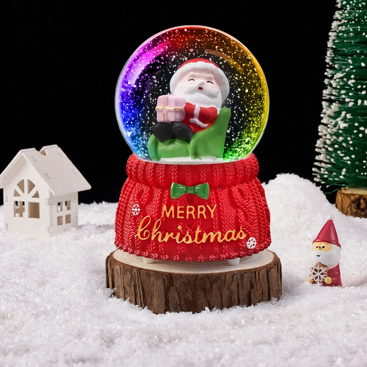 Christmas snow globe with music box and carriage design