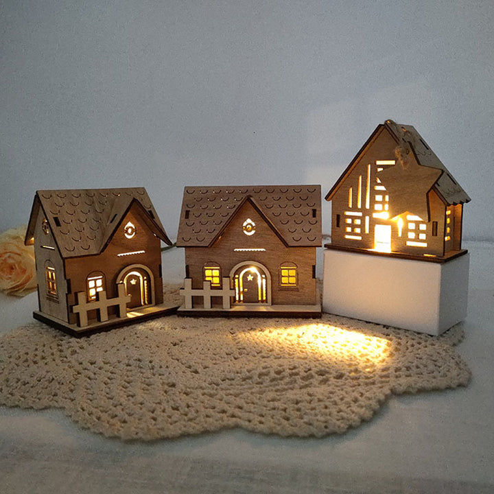 Illuminated wooden house for Christmas decoration