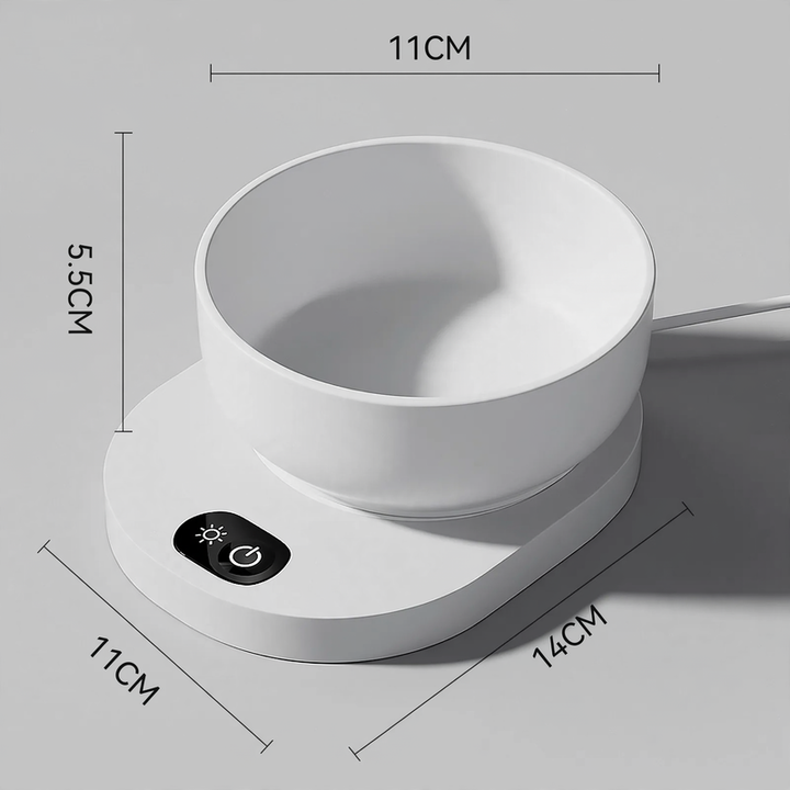 Heated drinking and feeding bowl for pets