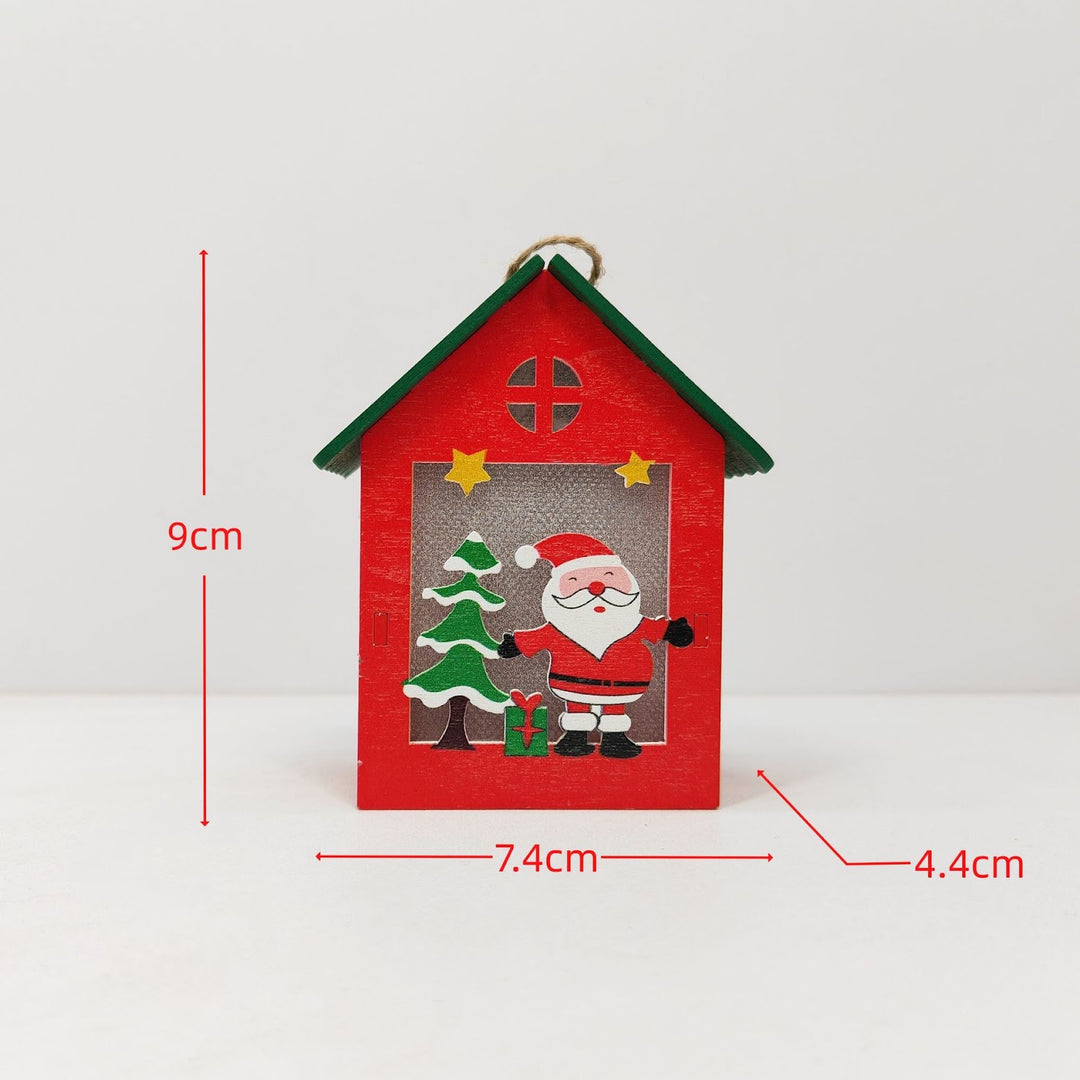 Illuminated wooden house for Christmas decoration